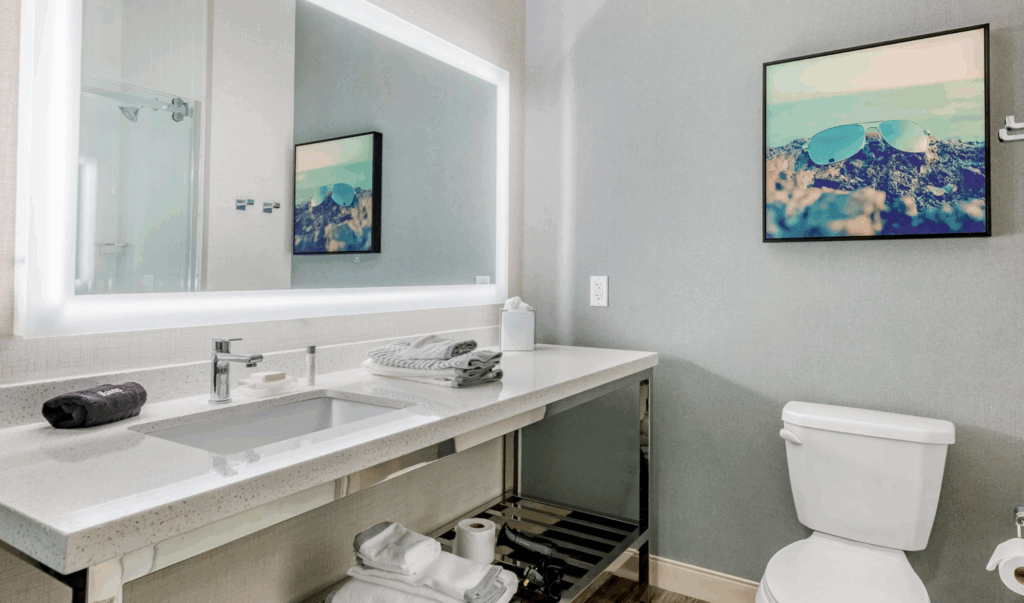 Modern Bathroom with Double Sink and Illuminated Mirror