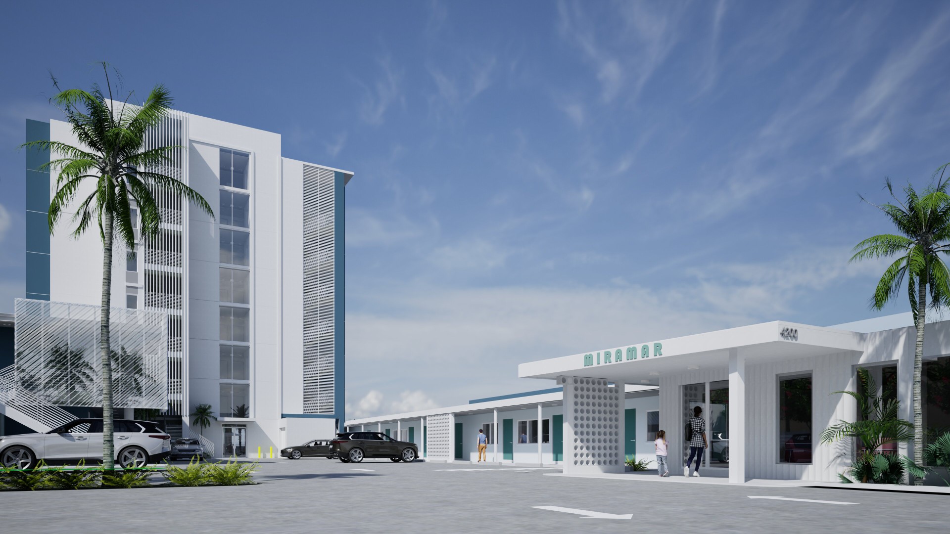 Street-Level View of Hotel Entrance Under Clear Blue Sky